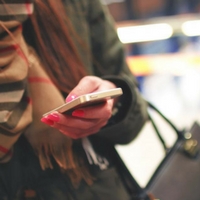 Woman looking at her phone.